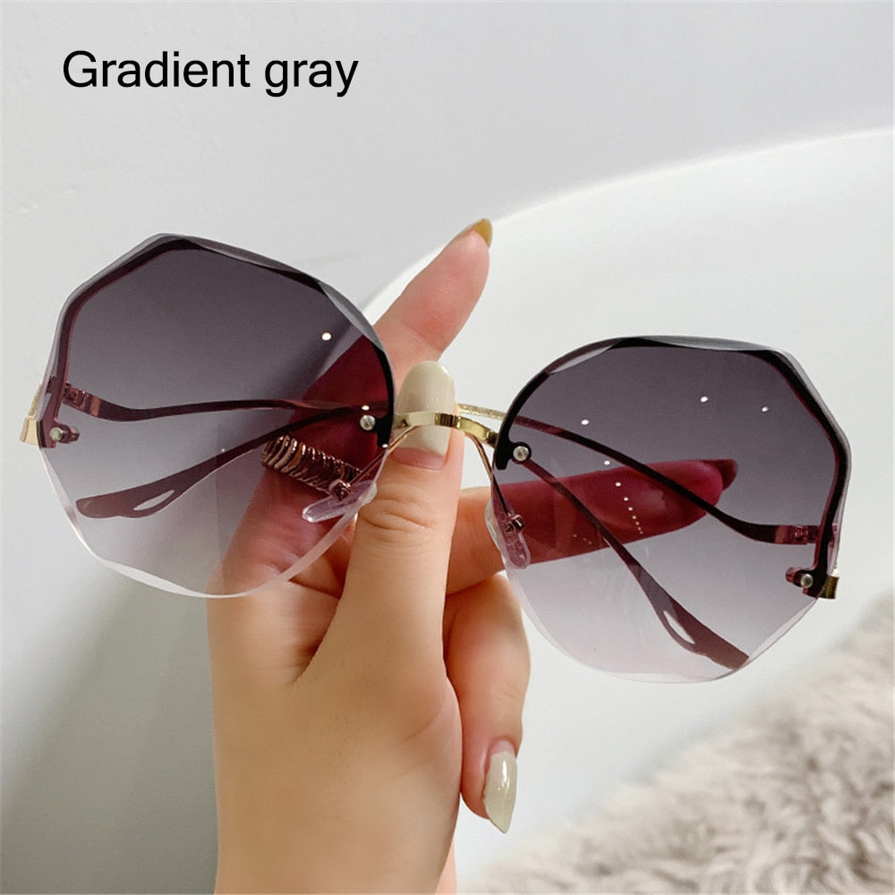 Damen Herren Randlose Sonnenbrille Luxus Shades UV400 Brillen Sonnenbrillen Neu